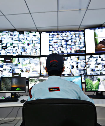 Security guard with radio on duty